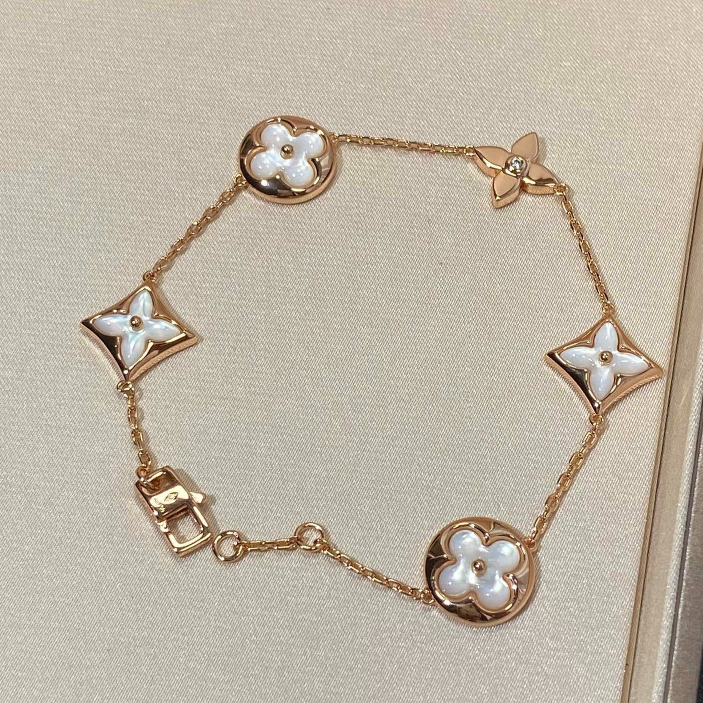 [Together Jewelry]STAR AND SUN 5 MOTIF MOP PINK GOLD BRACELET