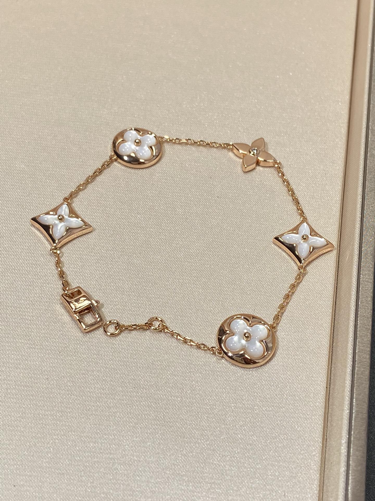 [Together Jewelry]STAR AND SUN 5 MOTIF MOP PINK GOLD BRACELET