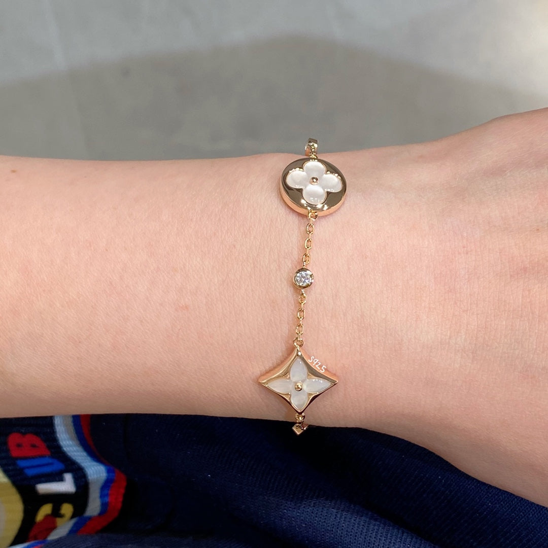 [Together Jewelry]STAR AND SUN 4 MOTIF WHITE MOP PINK GOLD BRACELET