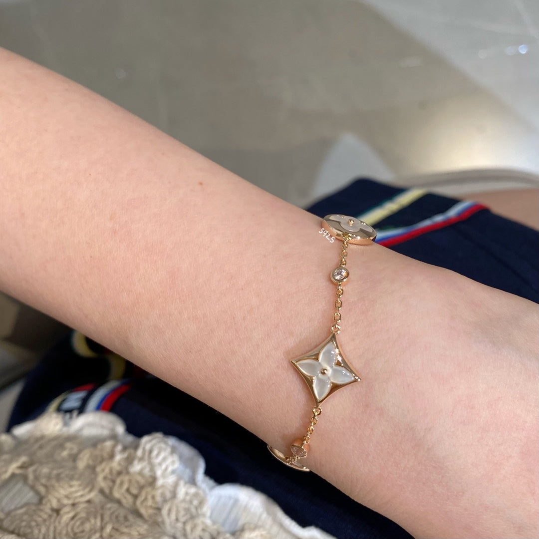 [Together Jewelry]STAR AND SUN 4 MOTIF WHITE MOP PINK GOLD BRACELET